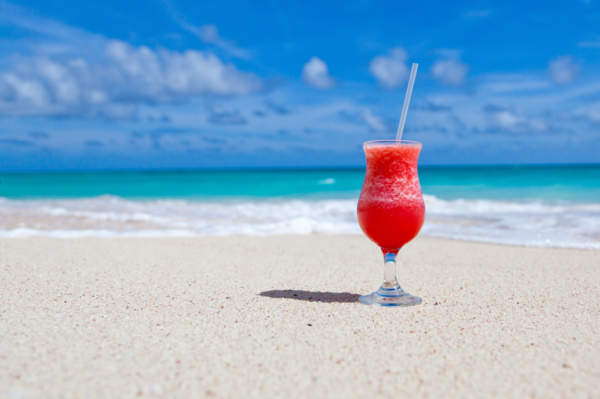 a stock image of a drink on a beach
