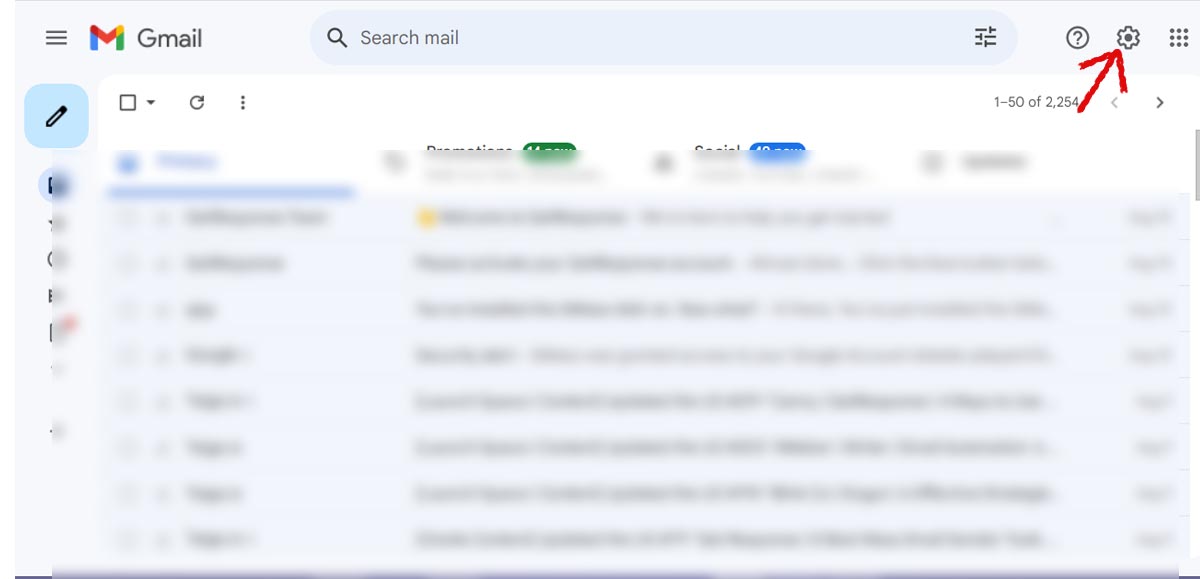 The settings icon in Gmail is situated at the top right corner